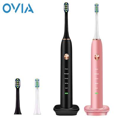 OVIA New Hot Wireless USB Charging Portable Sonic Electric Toothbrush 5 Modes 2 Replacement Brush Head for Adults Waterproof